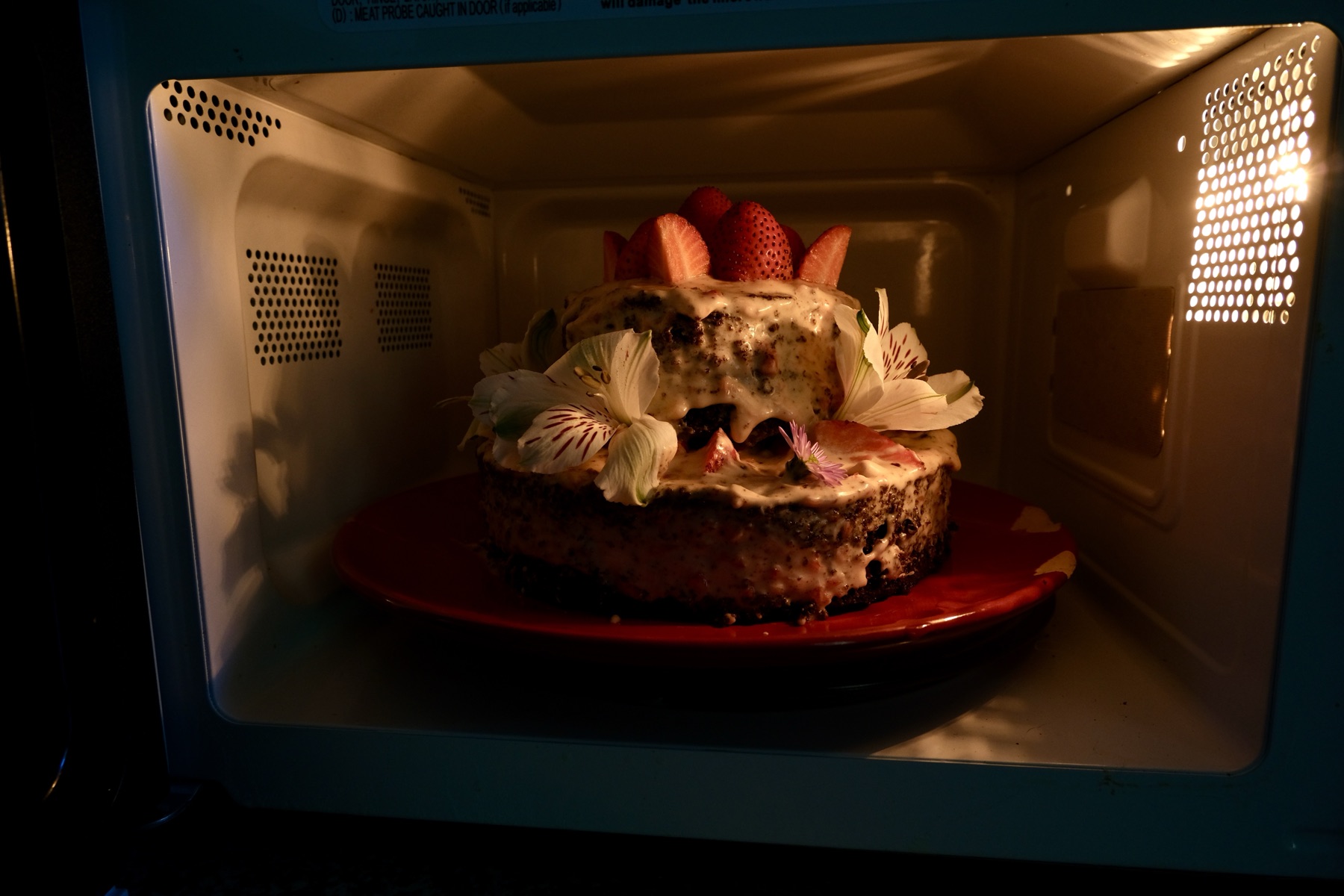 Cake in microwave at night